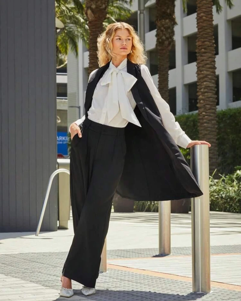 White Poet Blouse With a Long Black Waistcoat