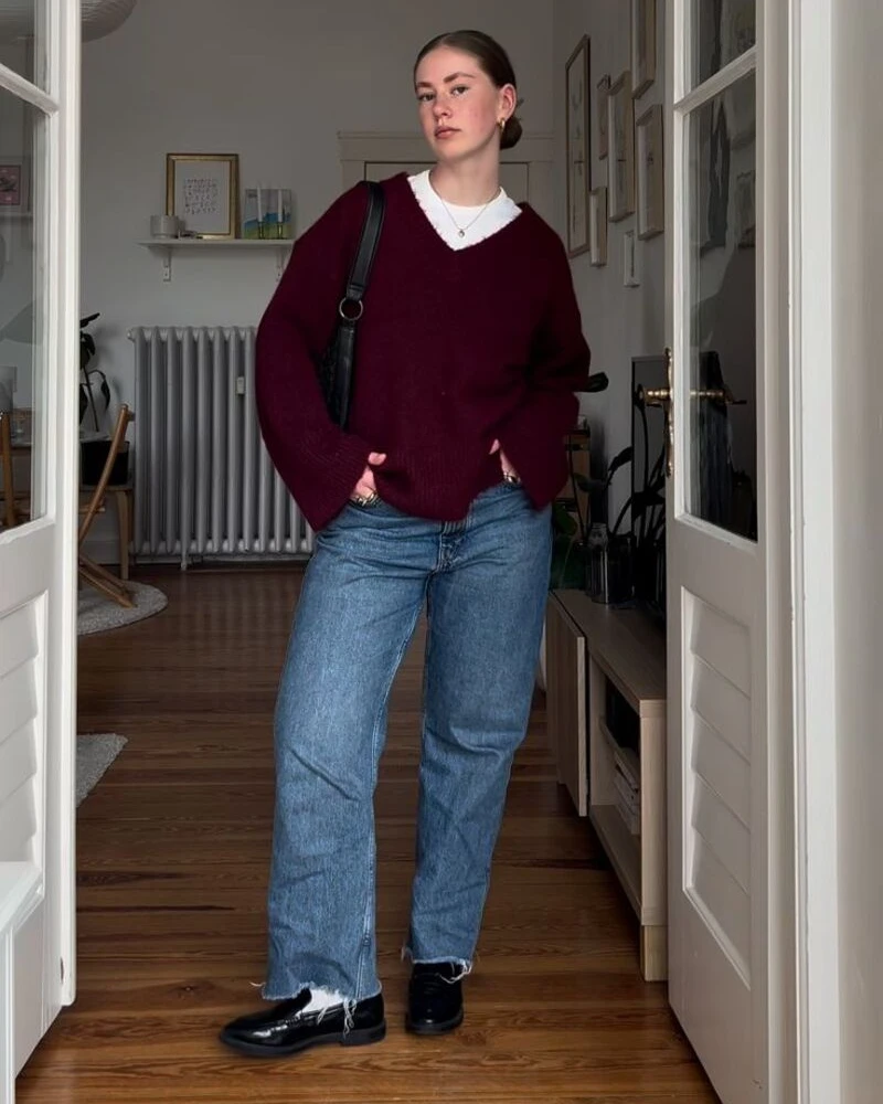 A Burgundy V-Neck Makes Cropped Jeans Feel Considered