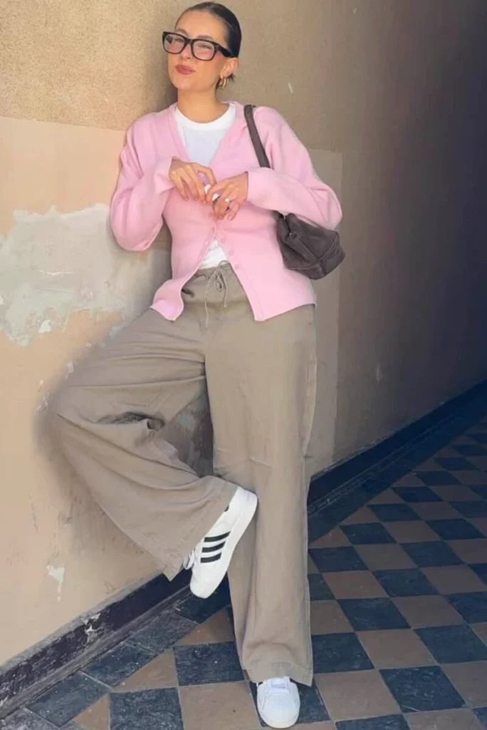 A Pink Cardigan Adds Color to Easy Taupe Trousers