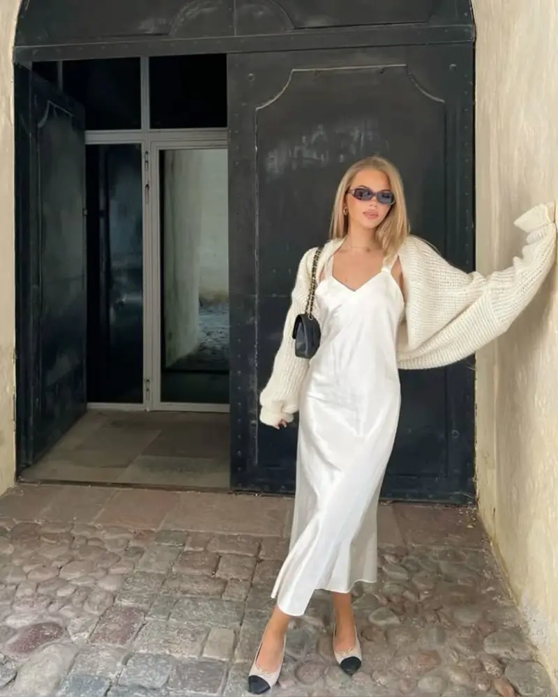An Ivory Slip Dress Finds Balance With a Chunky Cardigan