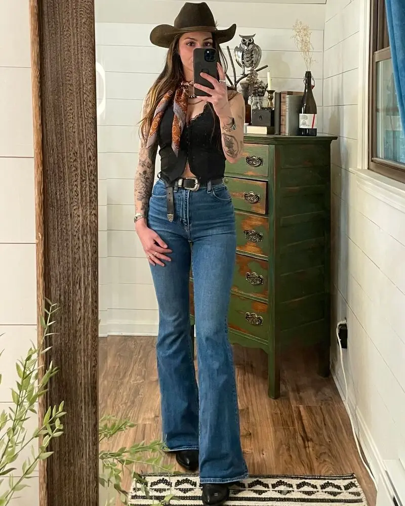 Black Lace With Flared Denim and a Western Hat