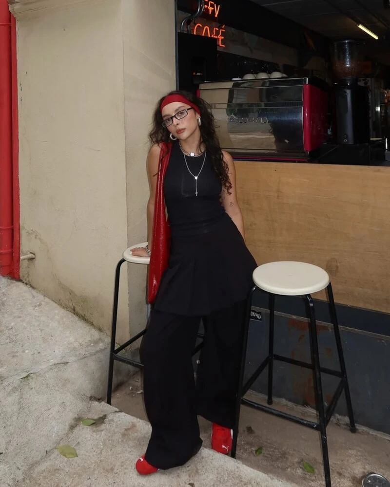 Black Tunic Layers With Red Accessories