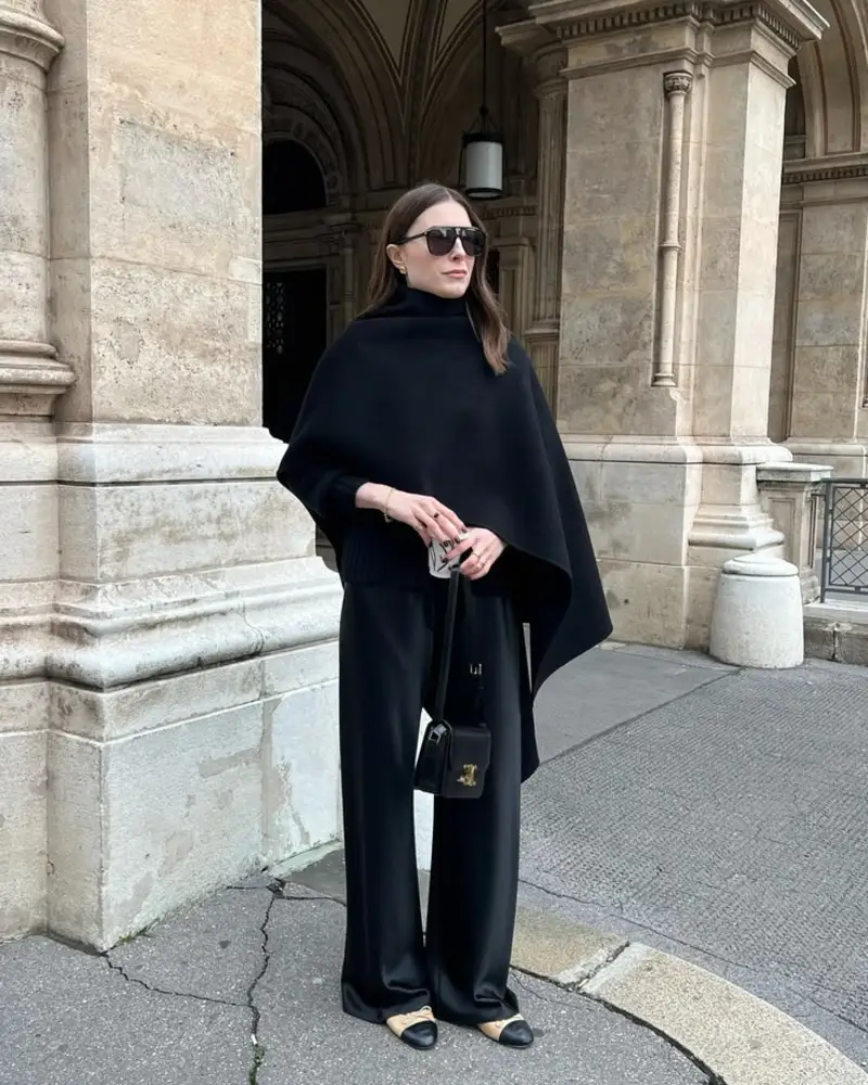 Draped Black Cape With Fluid Trousers